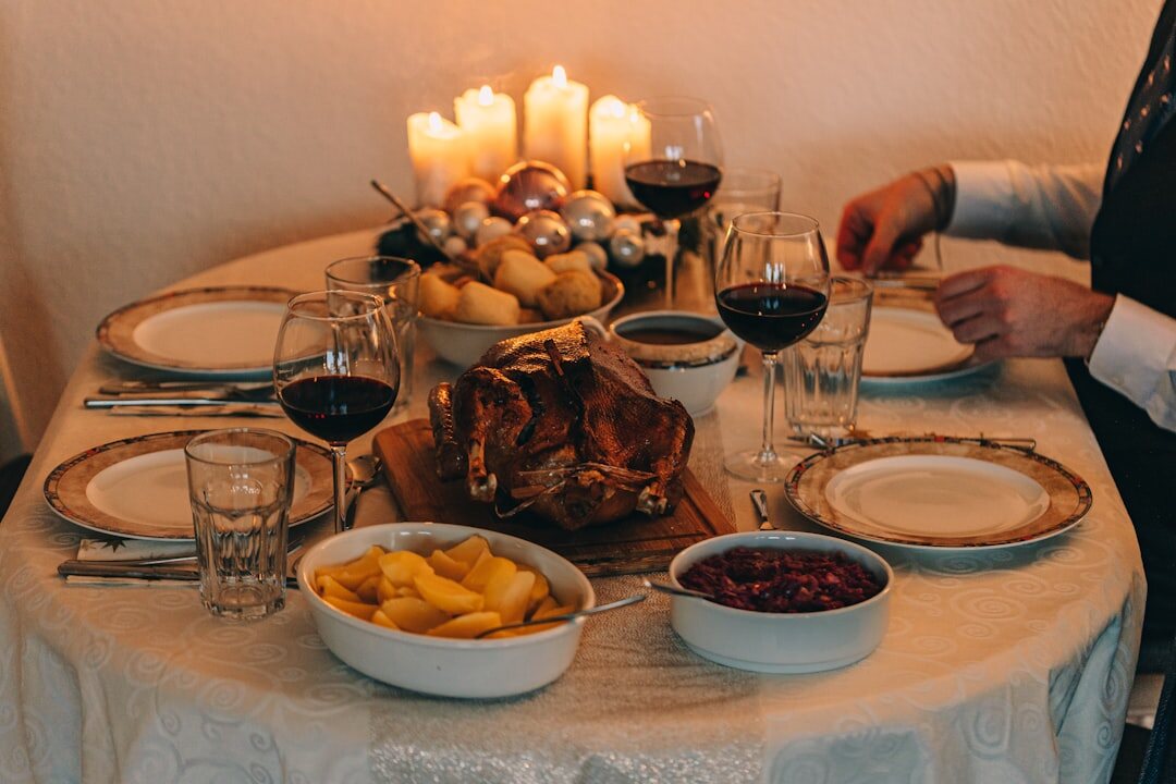 Traditional Czech meal with dumplings and sauce served on a rustic wooden table